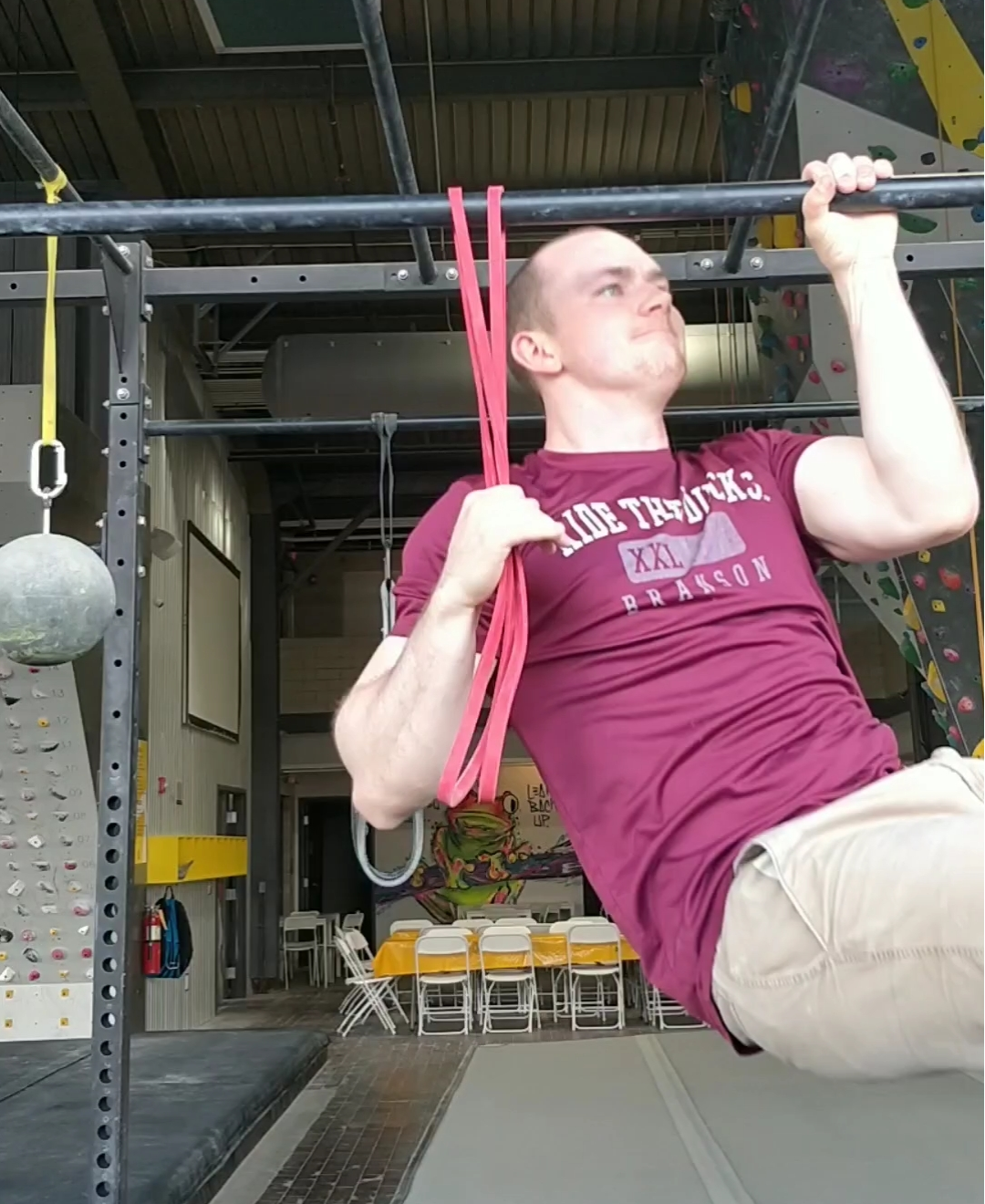 one arm pull up progression with band assistance